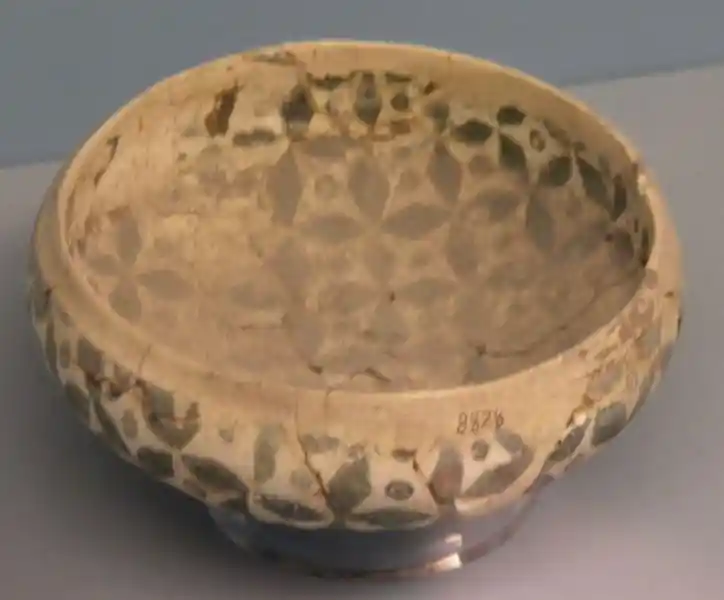 Clay bowl with overlapping circles and crosses design